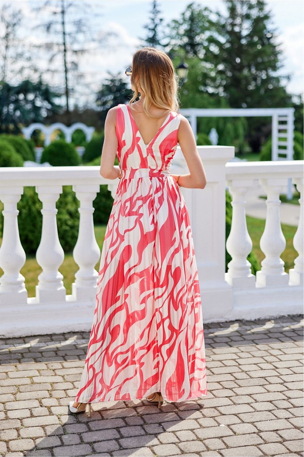 Graceful chiffon maxi dress with a floor-length hem, designed for a light and airy look, ideal for formal occasions or summer events