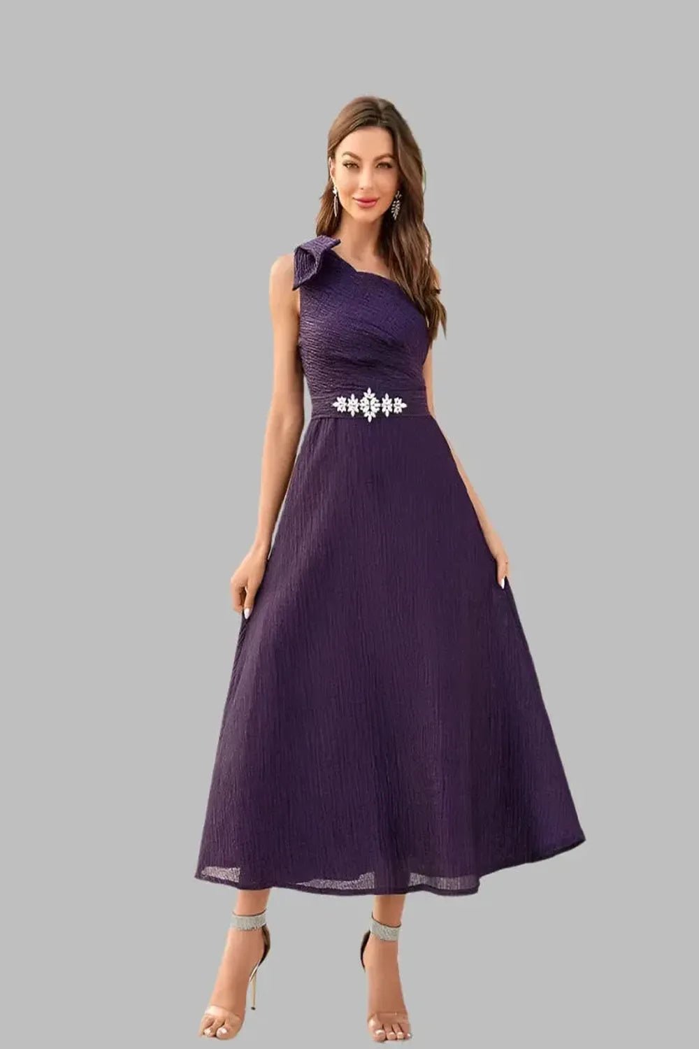  A Diagonal Neck Violet Slim Woven Dress featuring a stylish diagonal neckline and a fitted silhouette displayed on a mannequin against a neutral background.