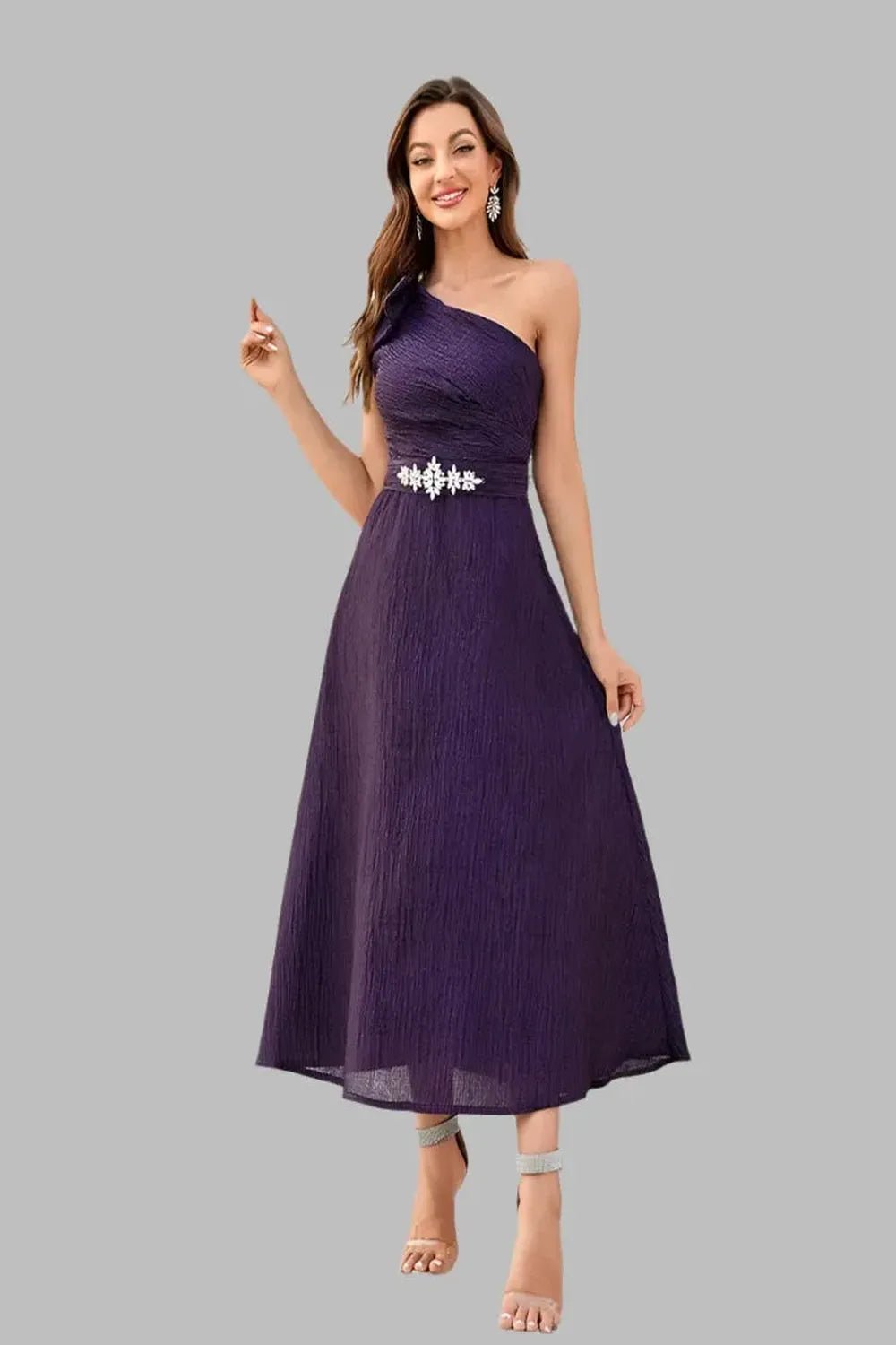  A Diagonal Neck Violet Slim Woven Dress featuring a stylish diagonal neckline and a fitted silhouette displayed on a mannequin against a neutral background.