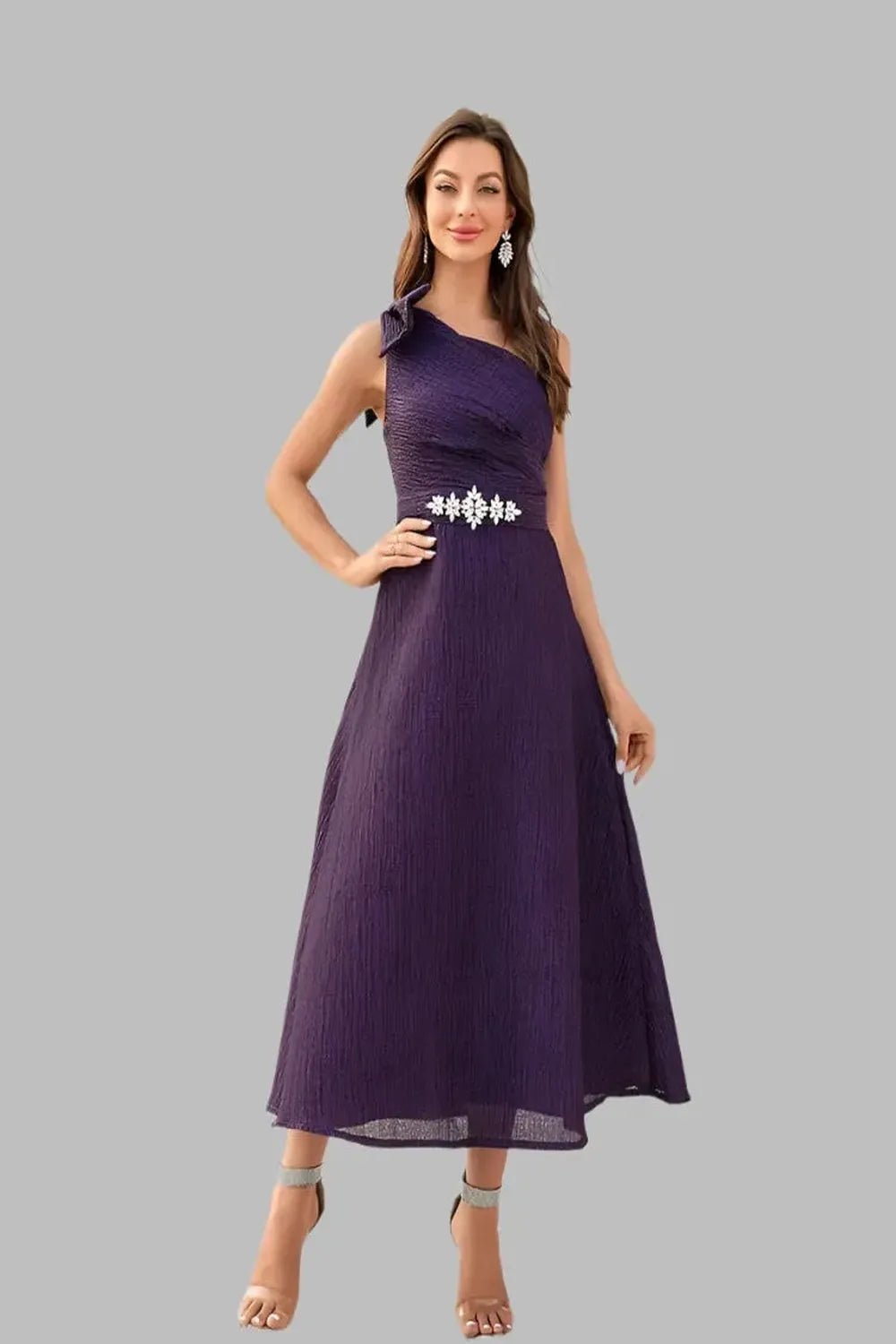  A Diagonal Neck Violet Slim Woven Dress featuring a stylish diagonal neckline and a fitted silhouette displayed on a mannequin against a neutral background.