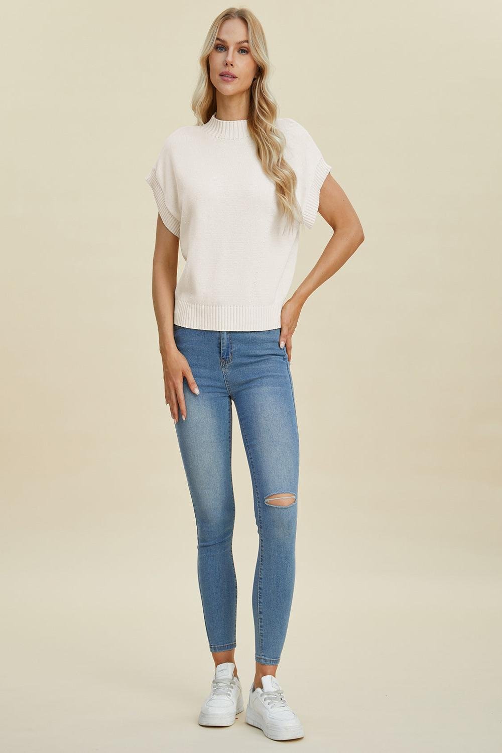  A light gray Double Take full size mock neck short sleeve sweater displayed on a mannequin featuring a relaxed fit and soft texture.