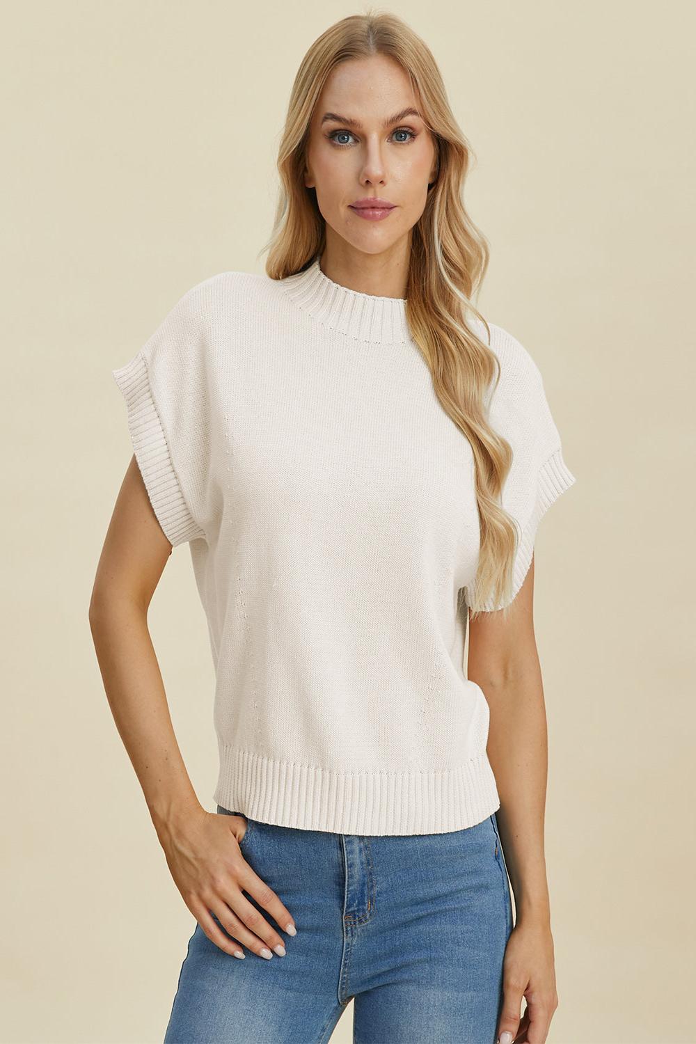  A light gray Double Take full size mock neck short sleeve sweater displayed on a mannequin featuring a relaxed fit and soft texture.