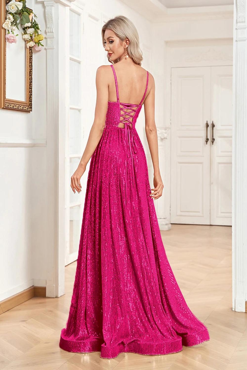 An elegant backless mermaid evening gown adorned with sequins featuring a fitted silhouette that flares at the bottom.