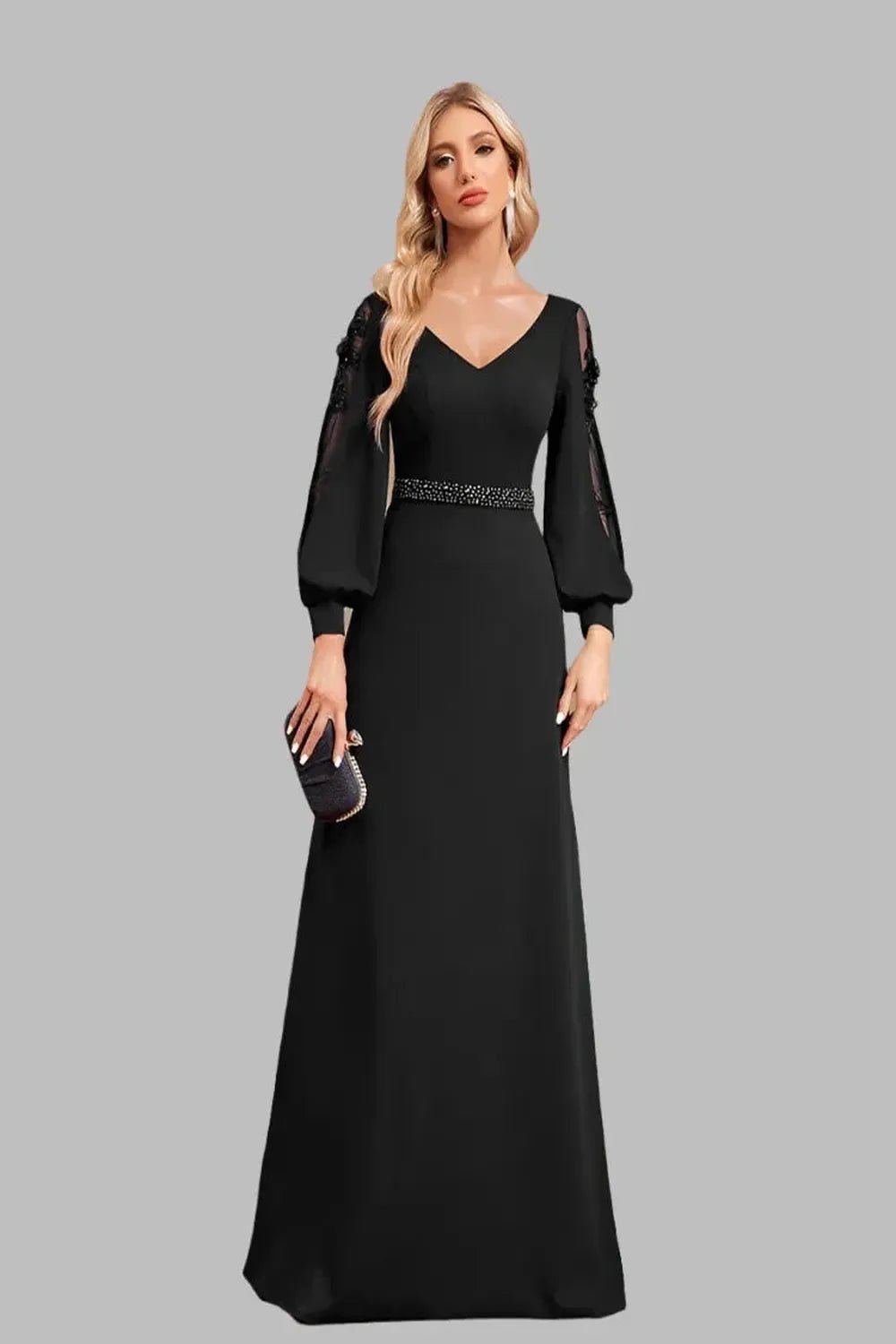 Elegant floorlength dress with long sleeves and a Vneck design featuring a flowing silhouette and sophisticated fabric.