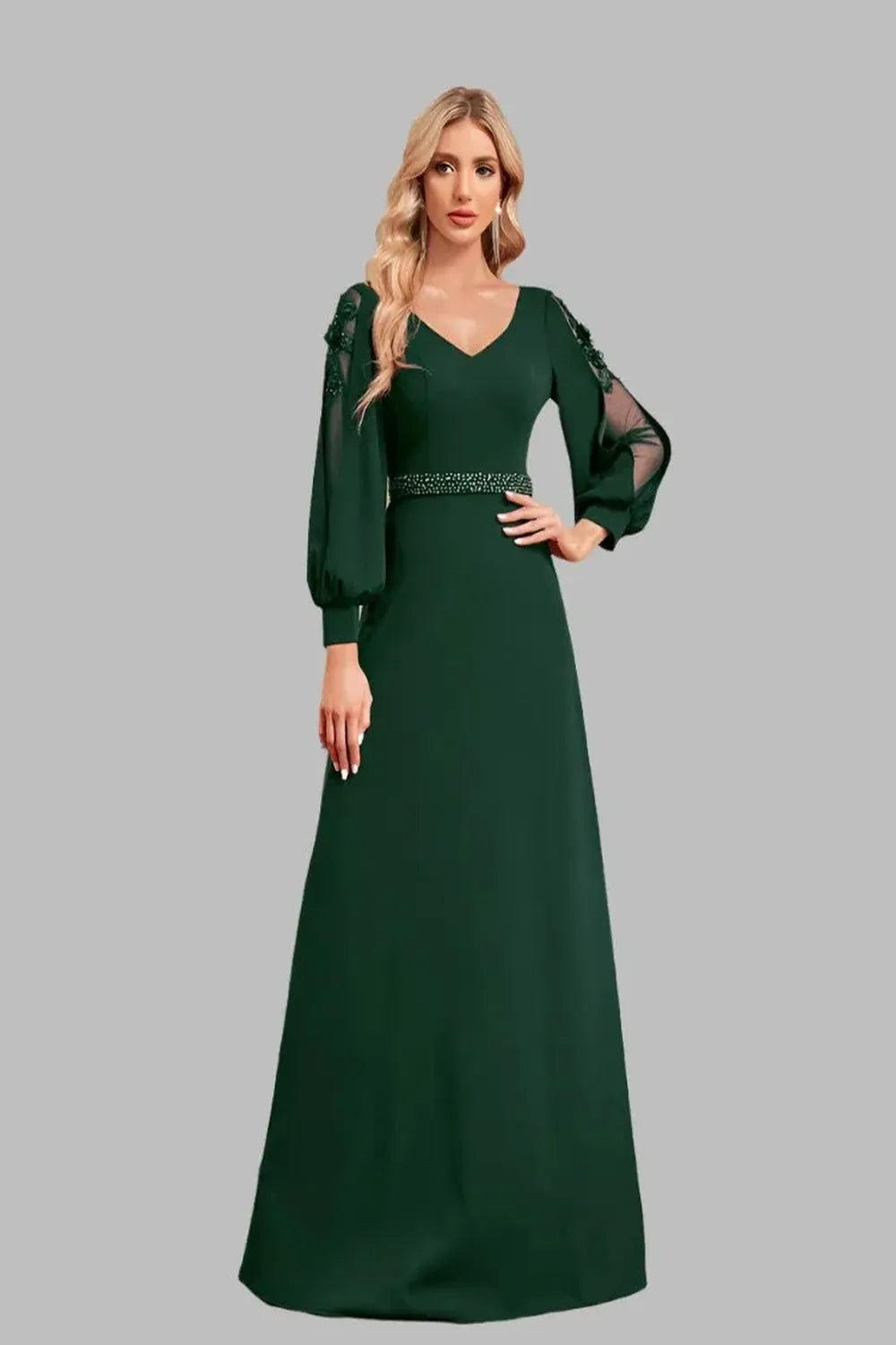 Elegant floorlength dress with long sleeves and a Vneck design featuring a flowing silhouette and sophisticated fabric.