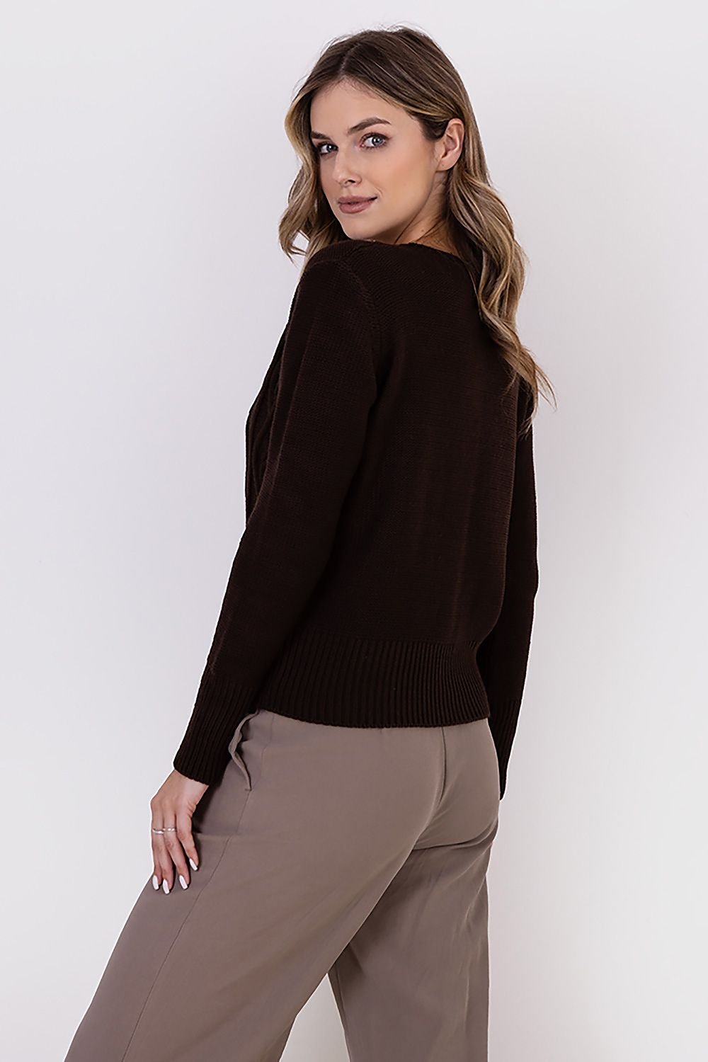 An elegant hiplength cardigan in a soft textured fabric featuring a relaxed fit open front and long sleeves.