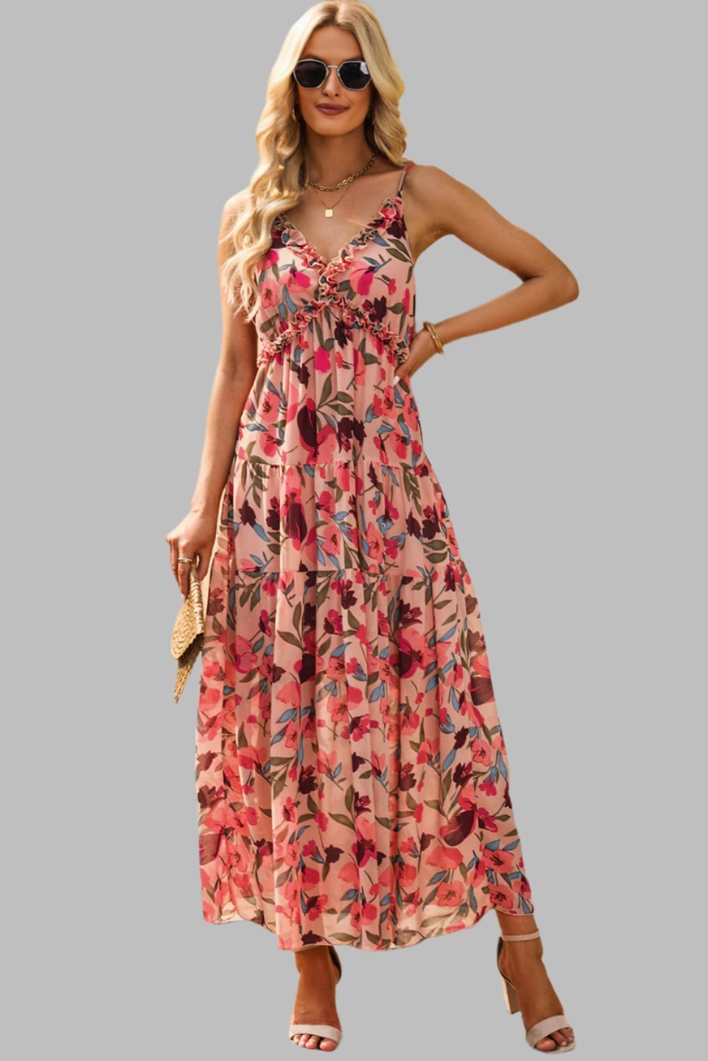 Chic floral maxi dress with frill trim, spaghetti straps, and V-neck.