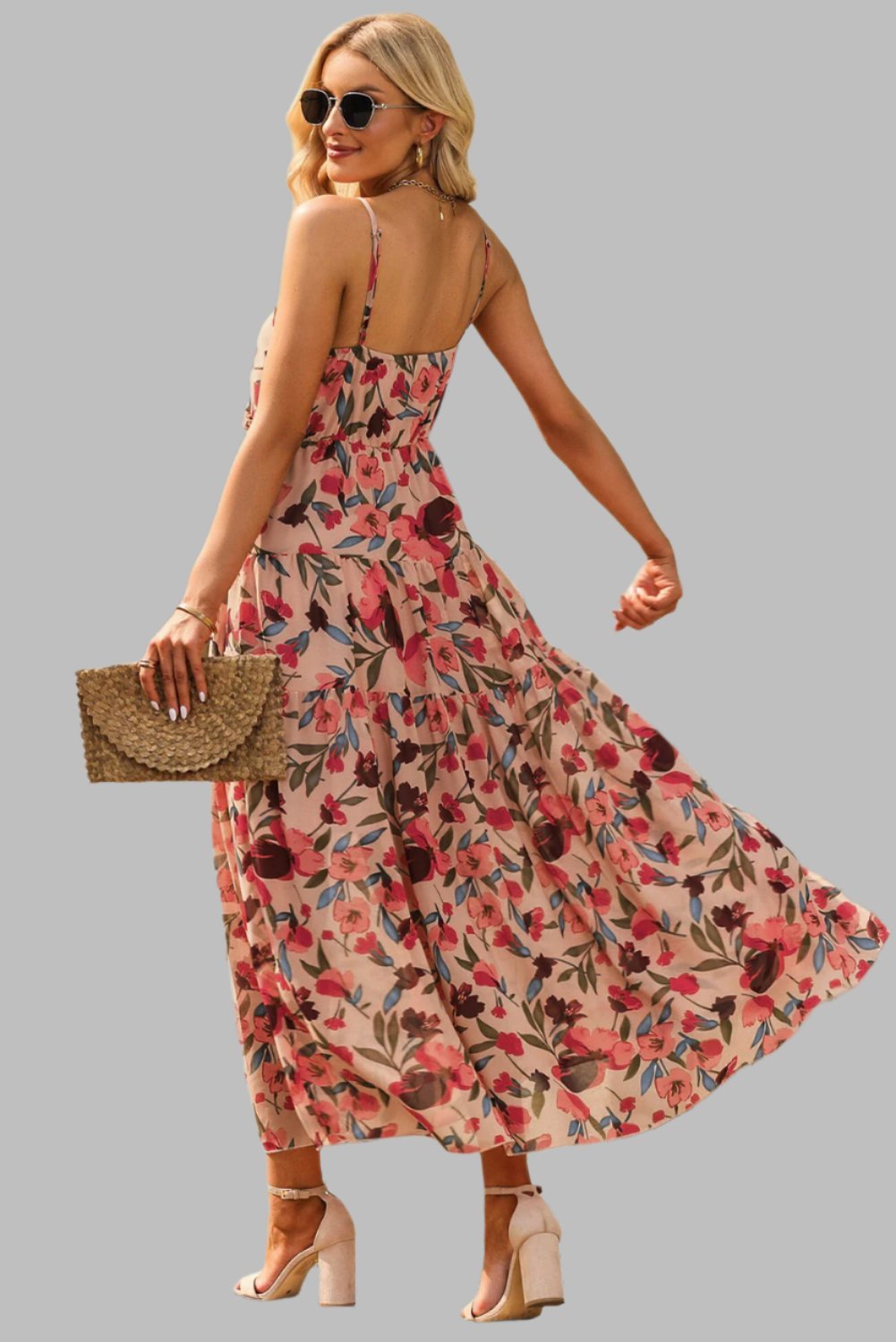 Chic floral maxi dress with frill trim, spaghetti straps, and V-neck.