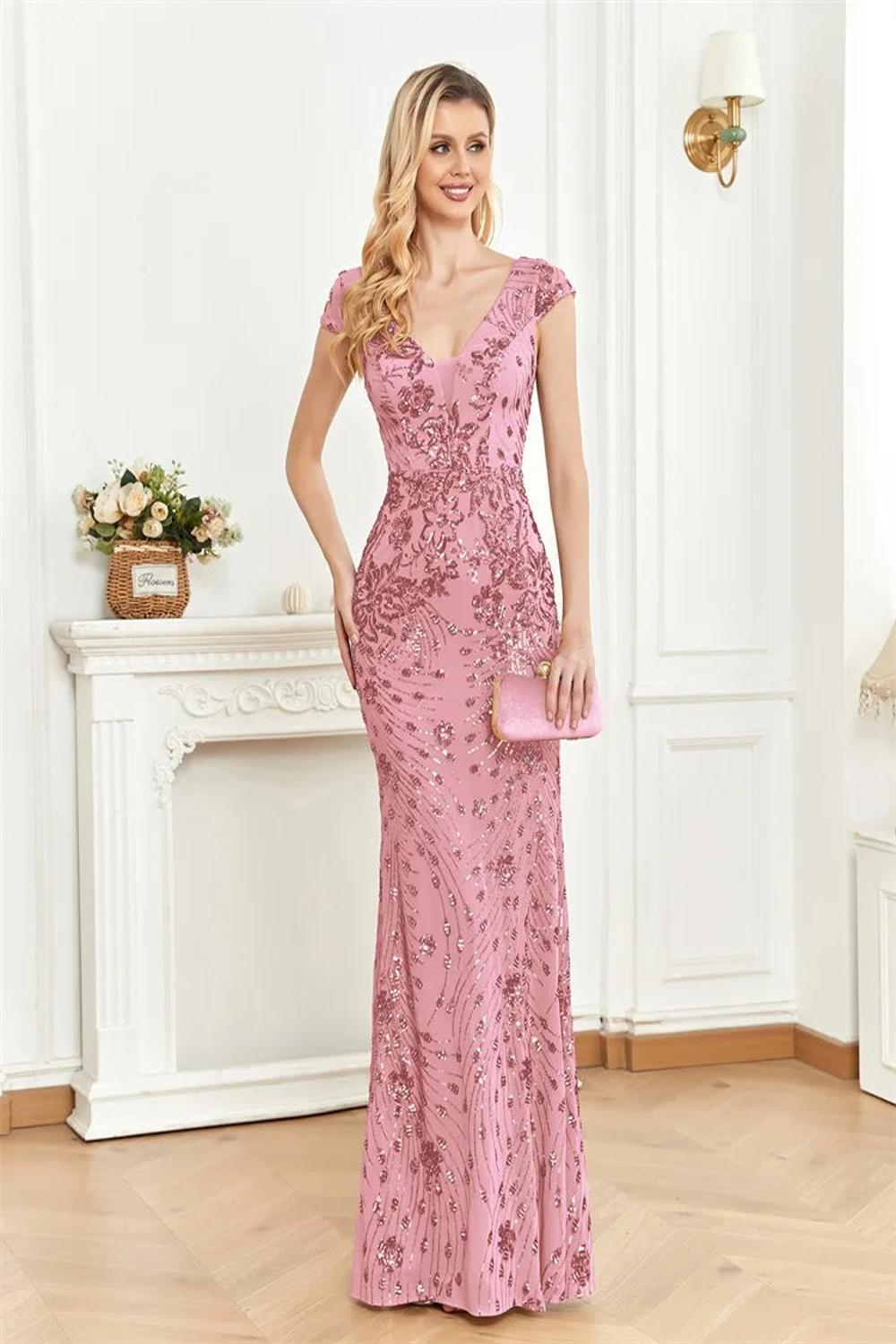 Elegant long formal dress adorned with shimmering sequins featuring a fitted bodice and flowing skirt perfect for prom weddings or cocktail parties.