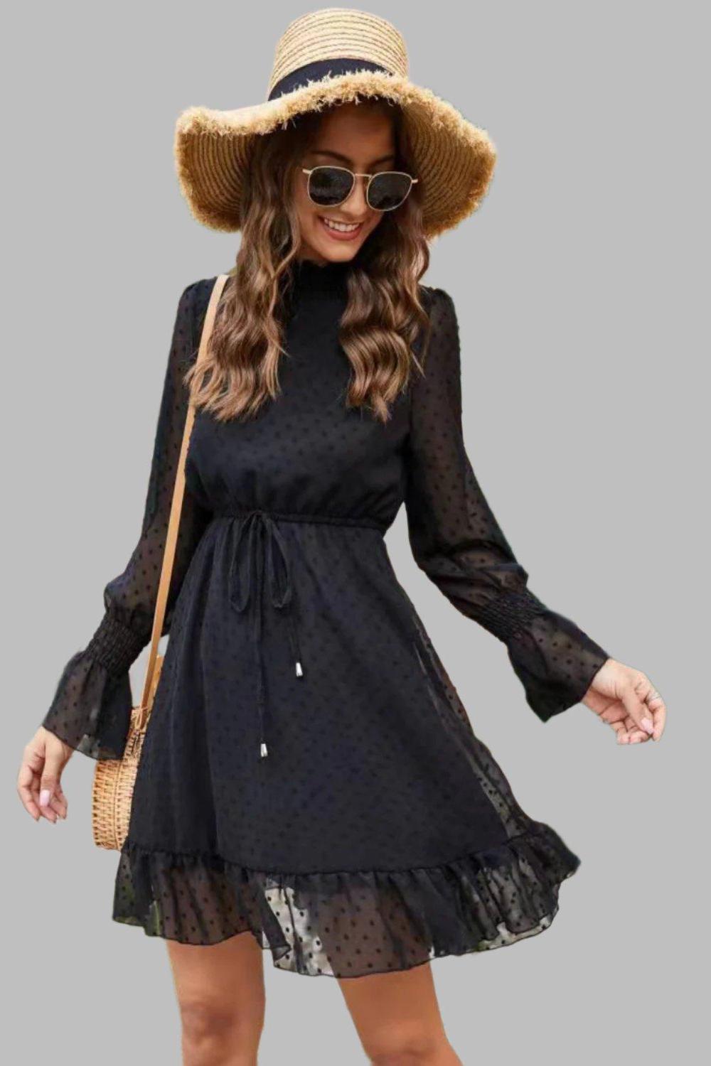 Mock Neck Flounce Sleeve Mini Dress with a mock neckline and flounce sleeves.