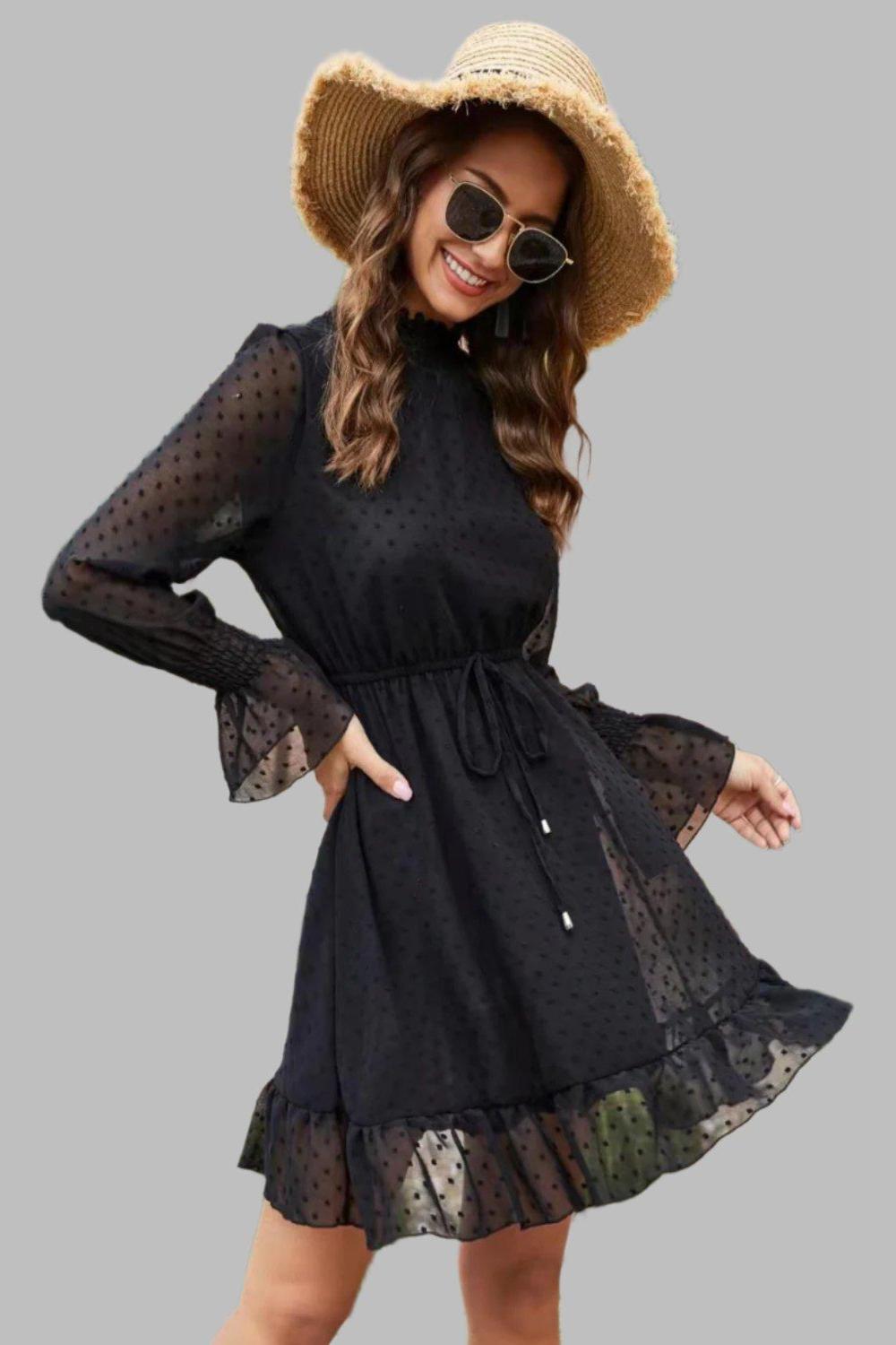 Mock Neck Flounce Sleeve Mini Dress with a mock neckline and flounce sleeves.