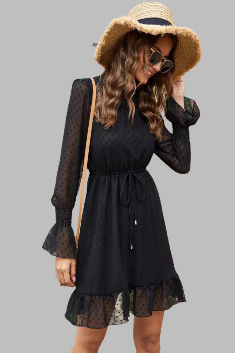 Mock Neck Flounce Sleeve Mini Dress with a mock neckline and flounce sleeves.