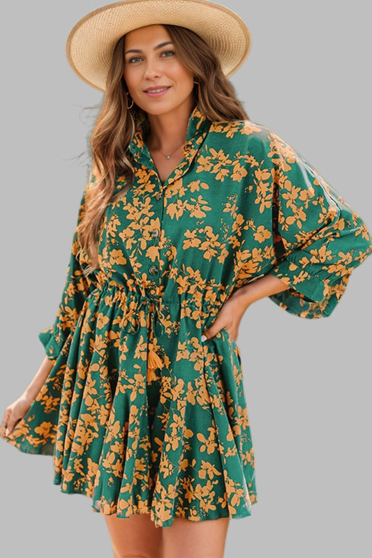 "Printed Three-Quarter Sleeve Mini Dress with a vibrant pattern and three-quarter length sleeves."