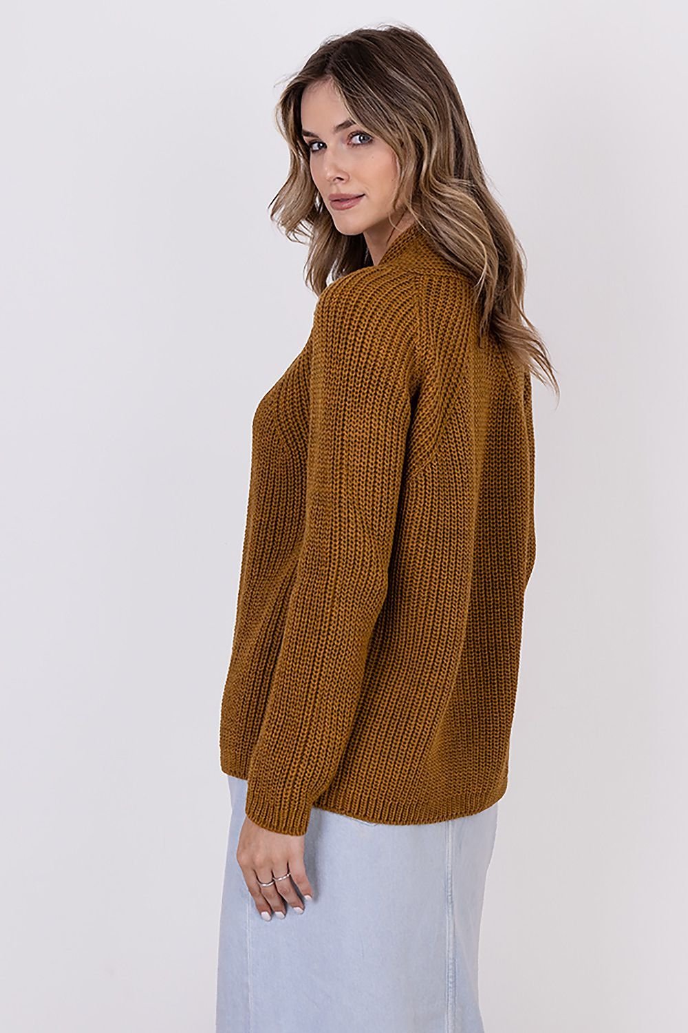  A ribbed cardigan featuring a standup collar showcasing a textured knit design in a neutral color.