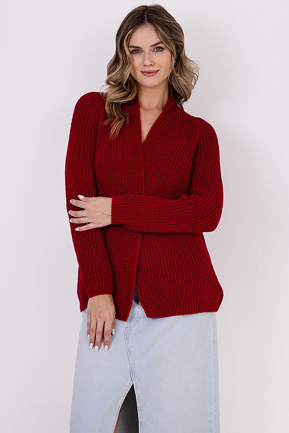  A ribbed cardigan featuring a standup collar showcasing a textured knit design in a neutral color.