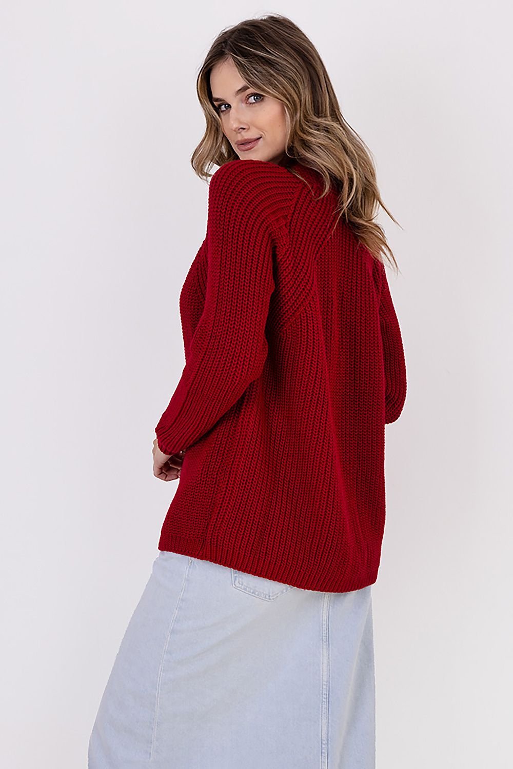  A ribbed cardigan featuring a standup collar showcasing a textured knit design in a neutral color.