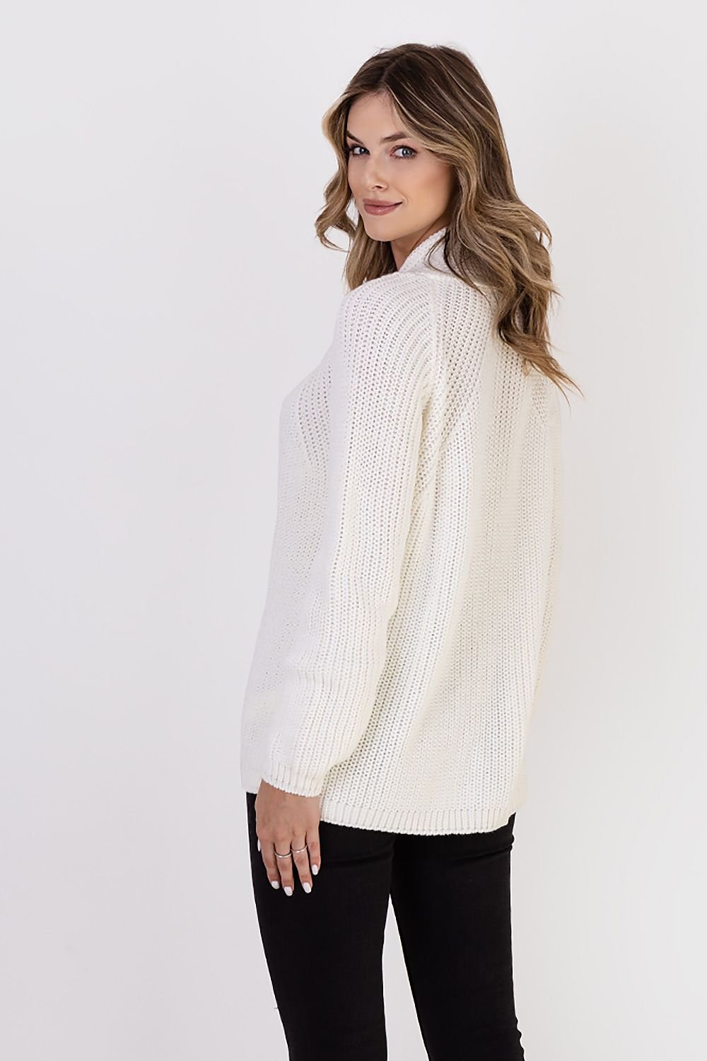  A ribbed cardigan featuring a standup collar showcasing a textured knit design in a neutral color.