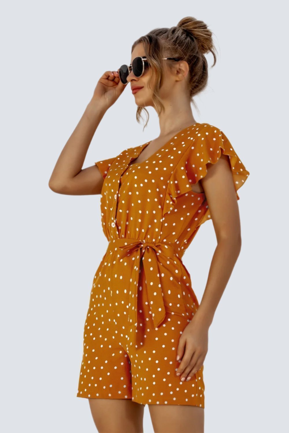 Ruffled Polka Dot Half Button Romper