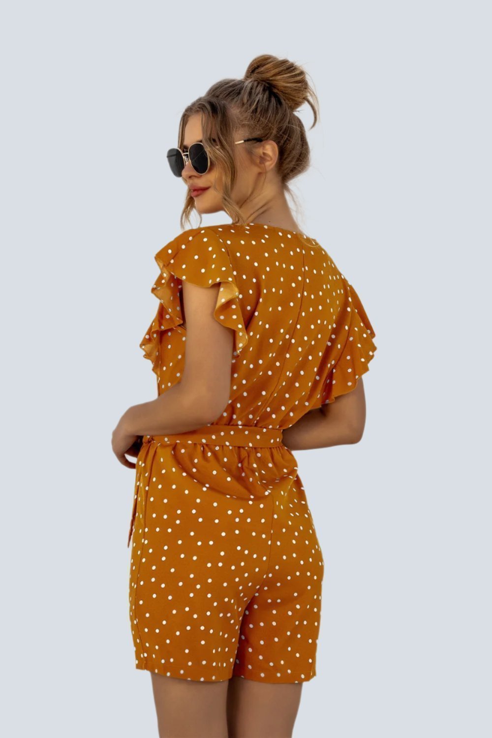 Ruffled Polka Dot Half Button Romper