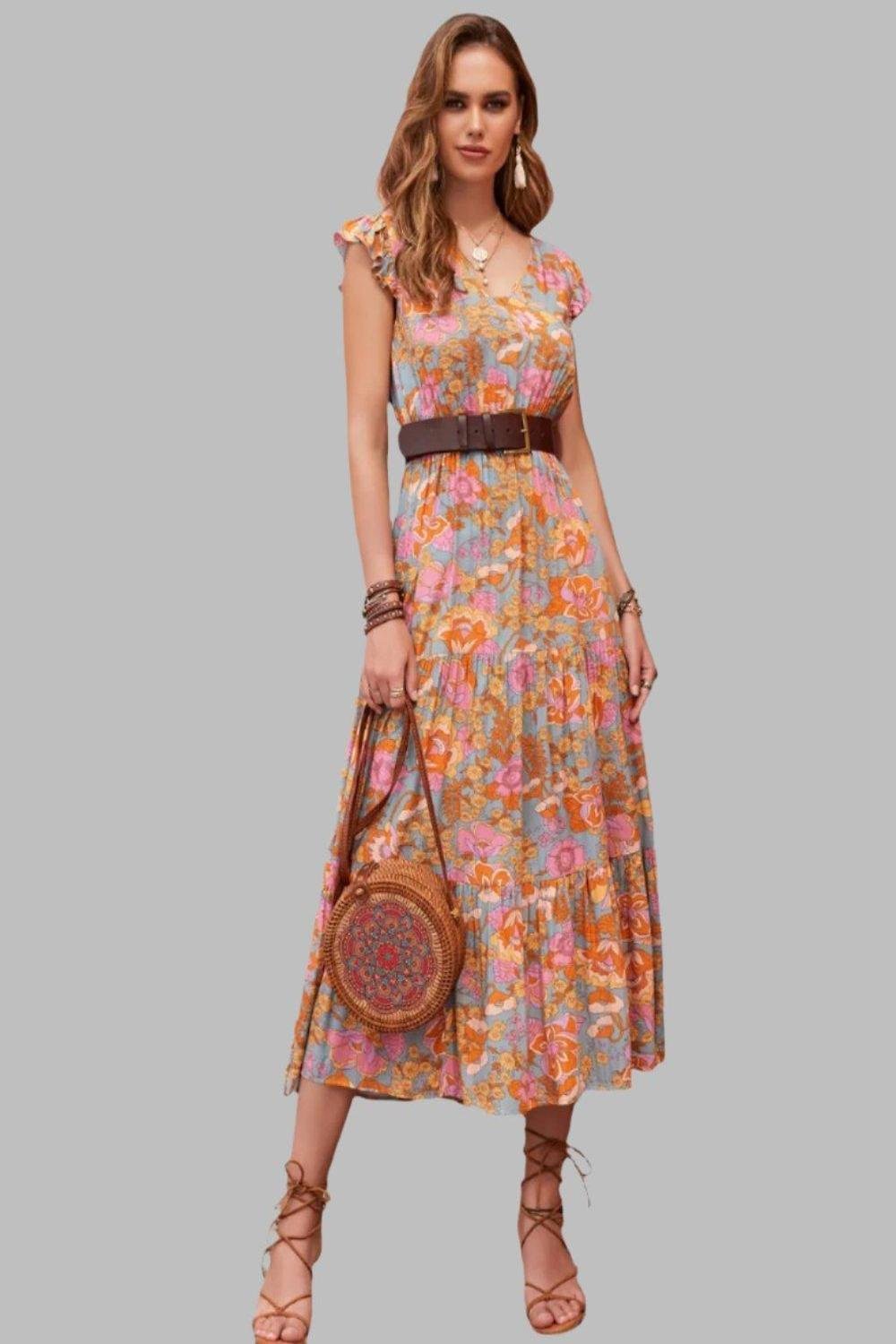 Ruffled Printed V-Neck Cap Sleeve Tiered Dress.