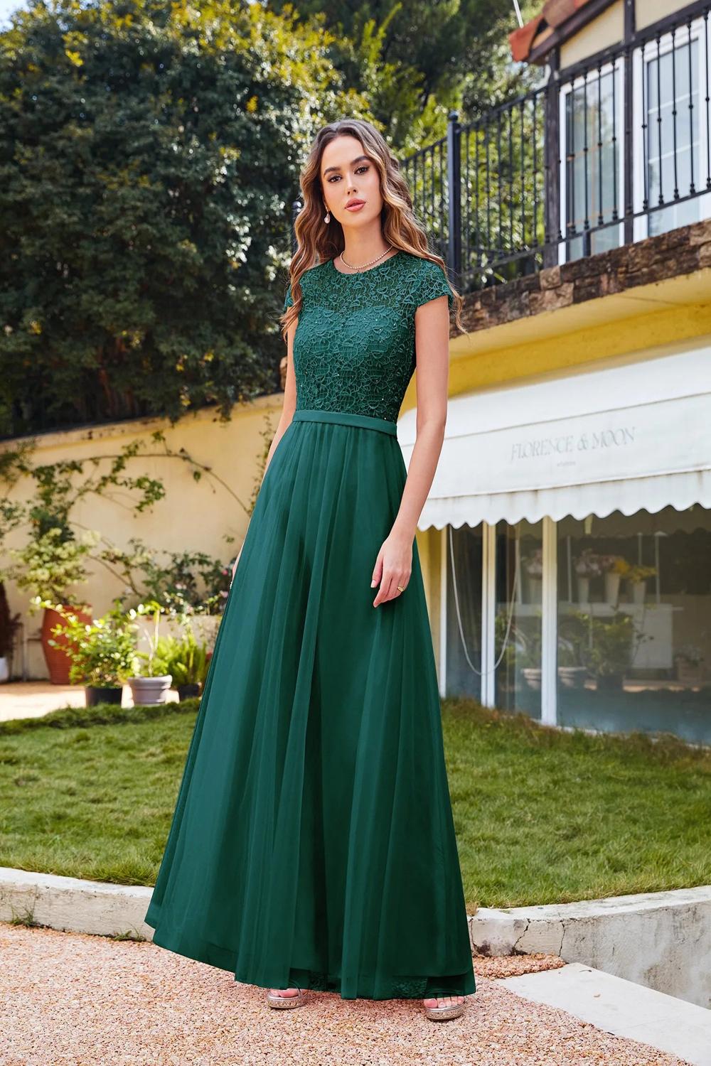 Elegant Aline floorlength dress with a scoop neckline and short lace sleeves designed for women attending special events or prom.