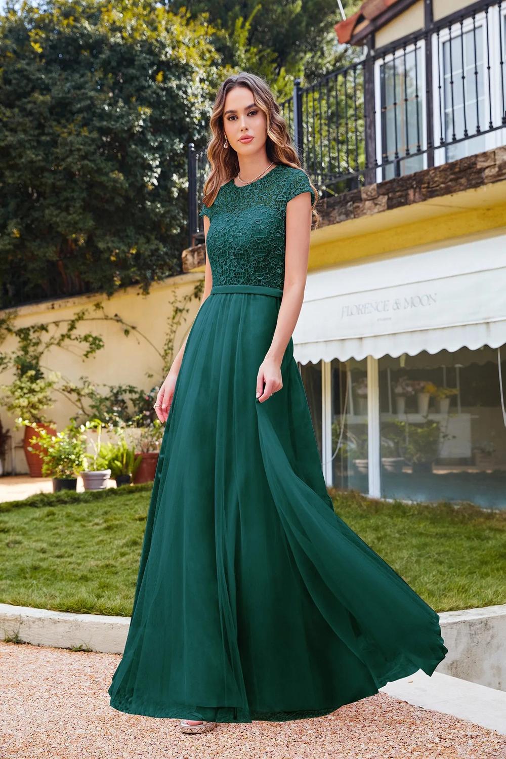 Elegant Aline floorlength dress with a scoop neckline and short lace sleeves designed for women attending special events or prom.