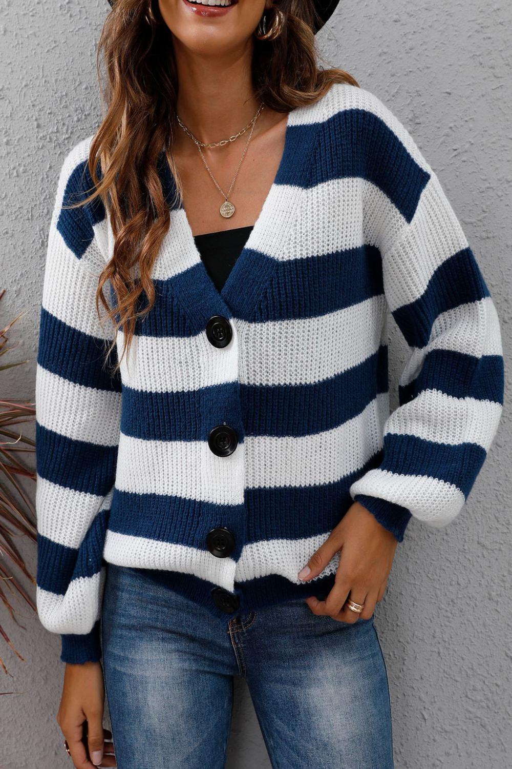 Striped long sleeve buttonup sweater featuring a mix of vibrant colors and a classic collar displayed on a neutral background.