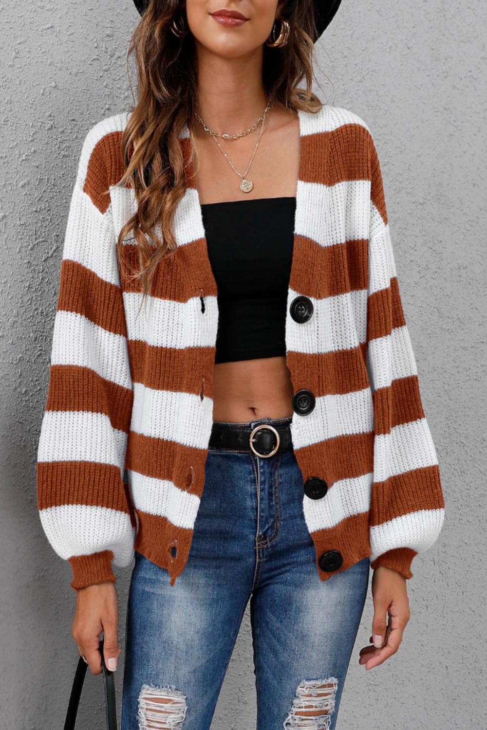 Striped long sleeve buttonup sweater featuring a mix of vibrant colors and a classic collar displayed on a neutral background.