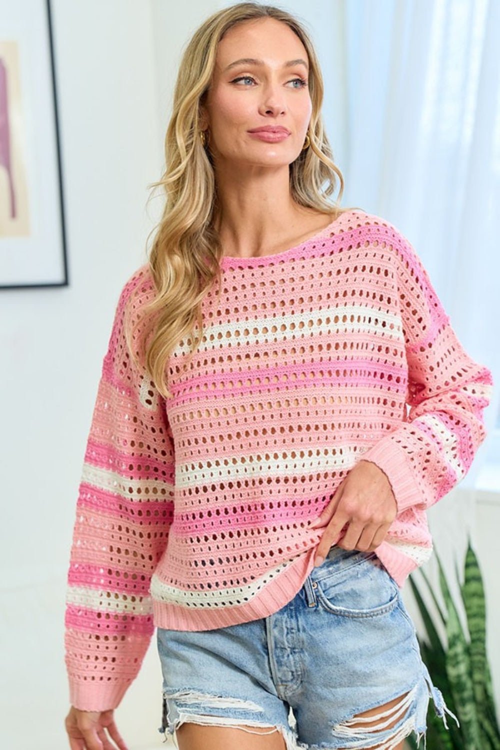 A stylish striped long sleeve openwork knit top featuring a lightweight breathable design with intricate patterns and a relaxed fit perfect for layering or casual wear.