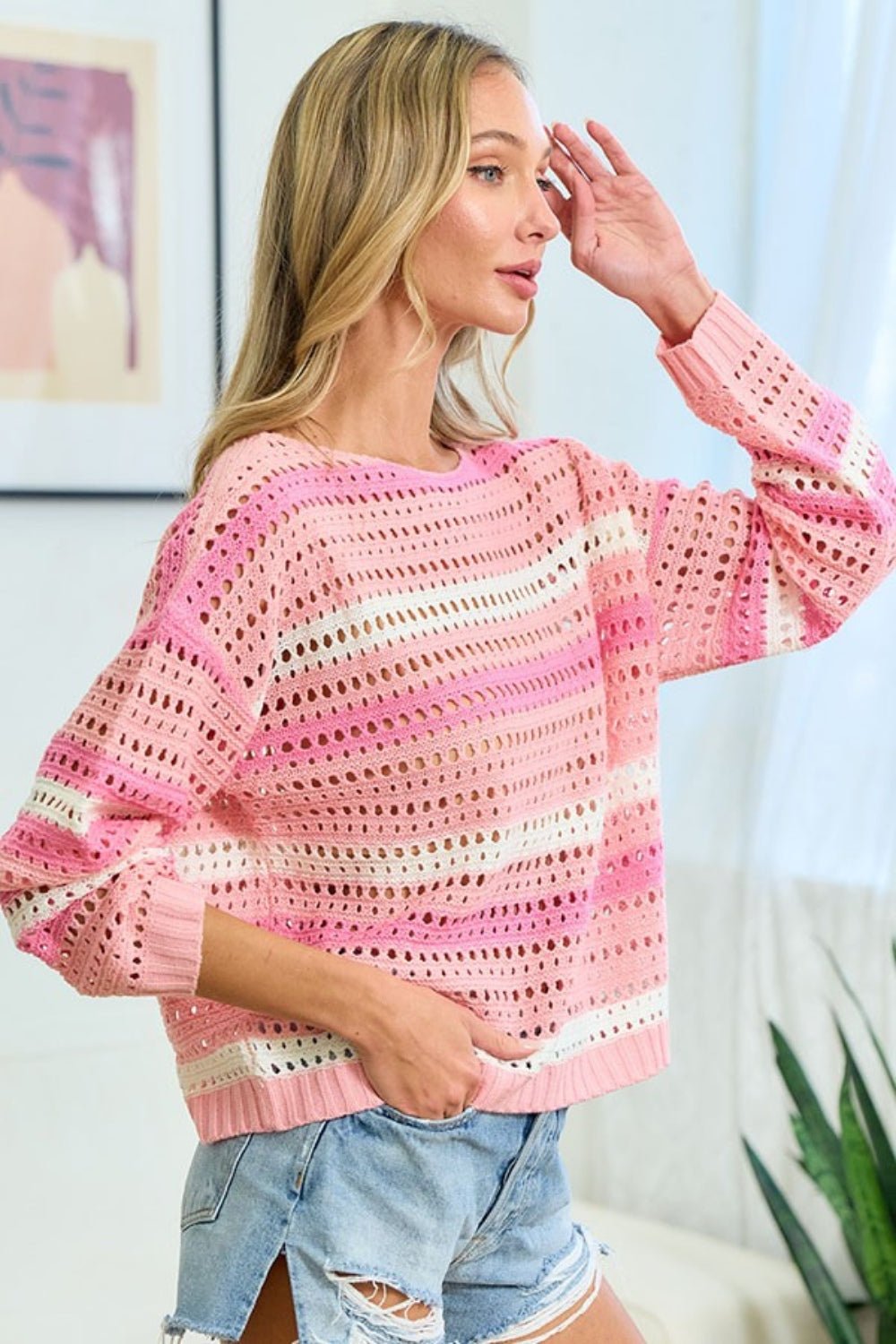 A stylish striped long sleeve openwork knit top featuring a lightweight breathable design with intricate patterns and a relaxed fit perfect for layering or casual wear.