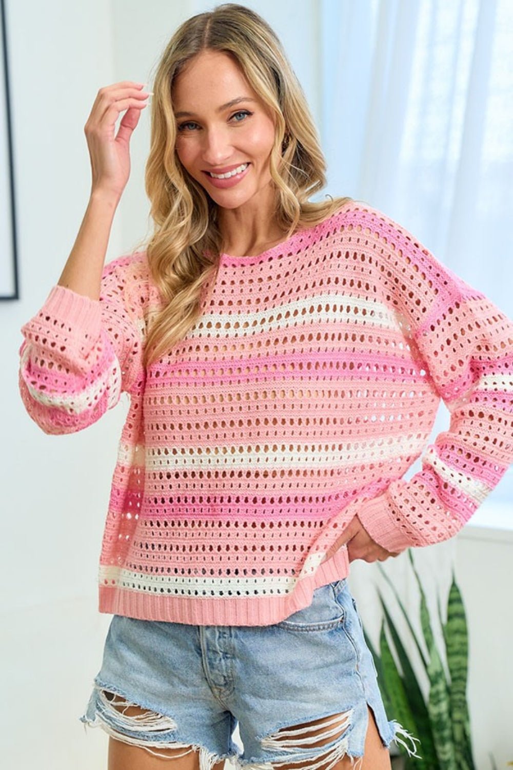 A stylish striped long sleeve openwork knit top featuring a lightweight breathable design with intricate patterns and a relaxed fit perfect for layering or casual wear.