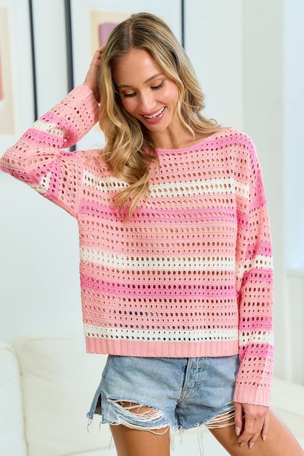 A stylish striped long sleeve openwork knit top featuring a lightweight breathable design with intricate patterns and a relaxed fit perfect for layering or casual wear.