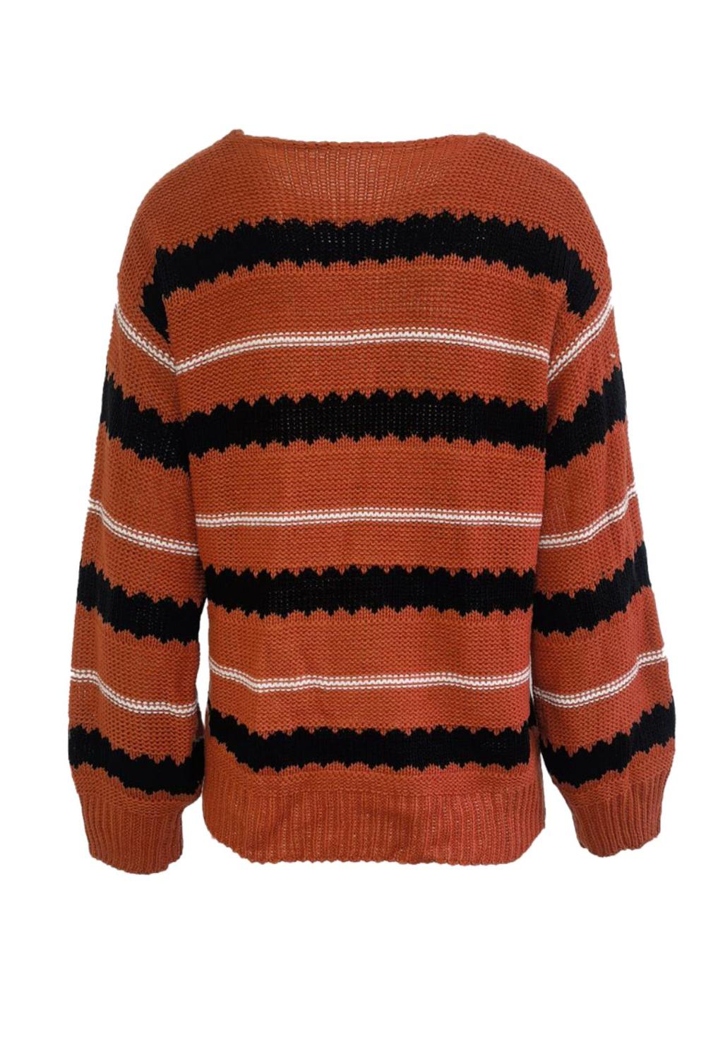 Striped round neck long sleeve sweater featuring a mix of bold colors and a relaxed fit displayed on a neutral background.