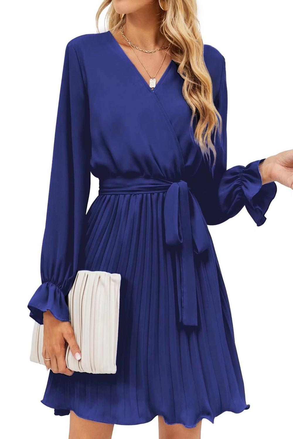  A stylish surplice flounce sleeve pleated mini dress in a vibrant color featuring a deep Vneckline flowing fl.