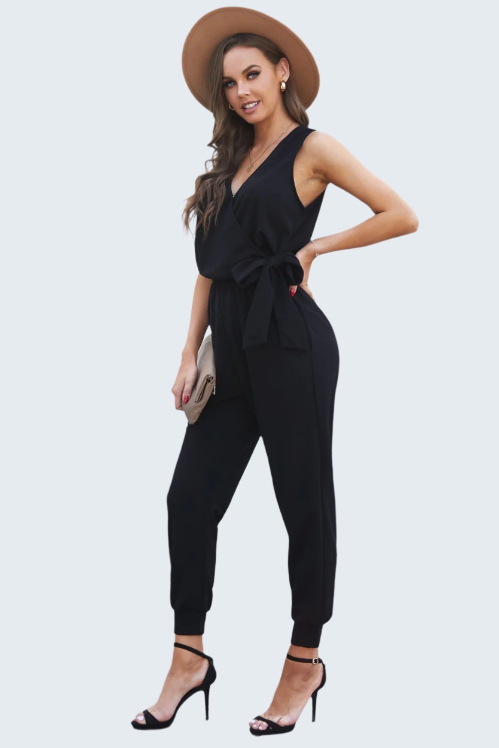 Stylish tied surplice neck sleeveless jumpsuit with a flattering fit, perfect for both casual outings and chic events.